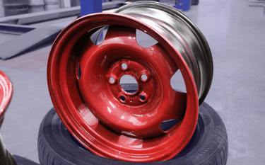 Red Steel Wheel at DA Techs - Diverse Automotive Technicians